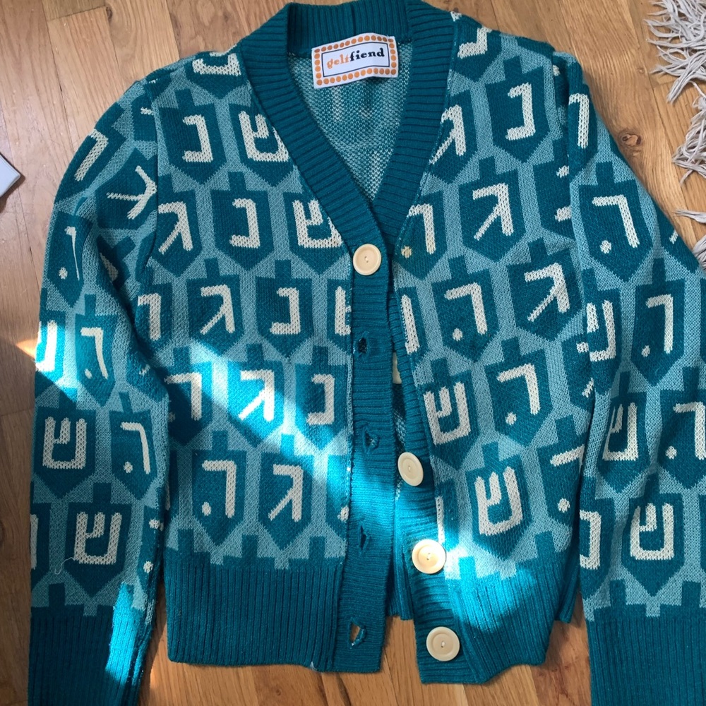 Jewish symbols cardigan. a vintage cardigan in great condition.